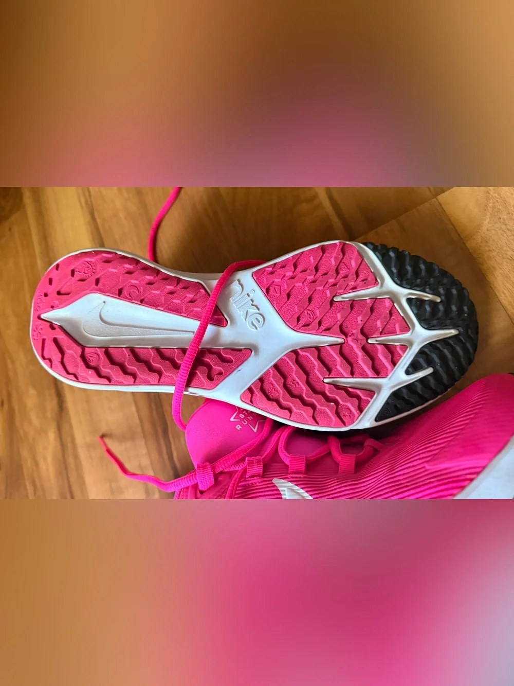 Nike Vibrant Pink Running Shoe with White Swoosh